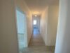 Frisch sanierte 3 Zimmer Wohnung in zentraler Lage in Bischofsheim - Flur.jpg