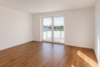 Attraktive 3-Zimmer-Wohnung mit durchdachtem Grundriss und schönem Ausblick - Wohnzimmer.png